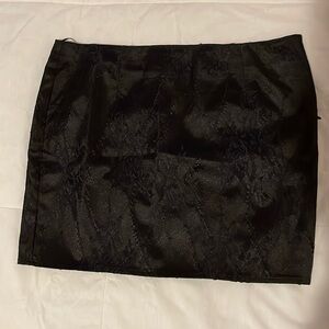 Pretty Little Thing- shape black embroidered low rise mini skirt